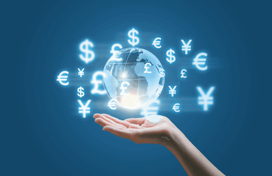 Hand holding a glowing digital globe surrounded by currency symbols, representing access to over 100 currencies across 140+ countries through MTFX's global FX network.