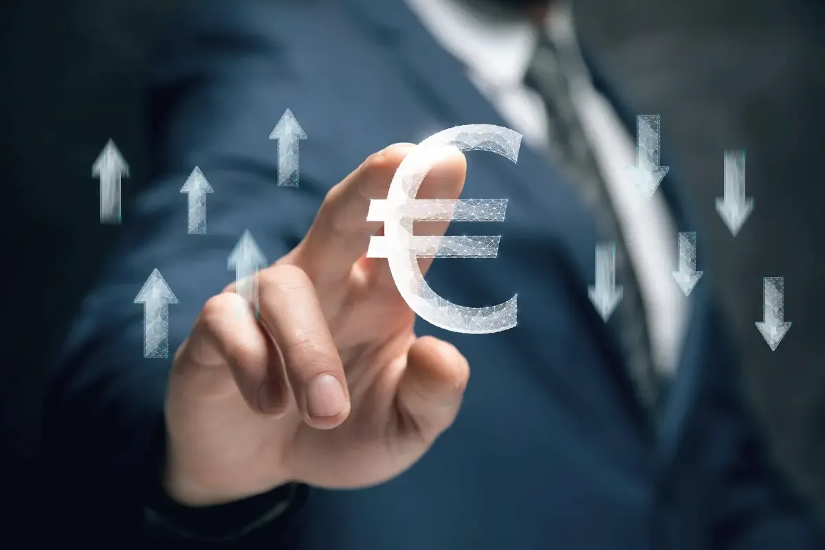 Close-up of a business professional touching a glowing euro symbol surrounded by rising and falling arrows, representing euro exchange rate movements, currency volatility, and foreign exchange trends.