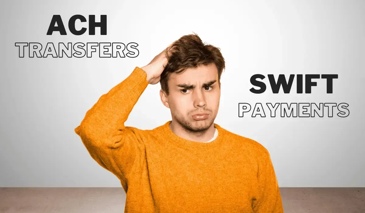 Confused man scratching his head, standing between the terms 'ACH Transfers' and 'SWIFT Payments,' representing confusion and uncertainty about international payment methods.