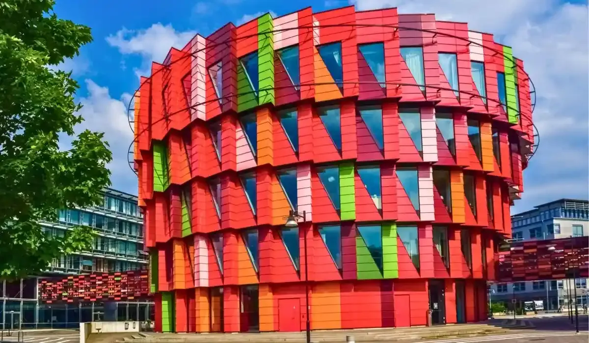 Colorful modern building at Chalmers University of Technology in Gothenburg, Sweden, featuring geometric red, orange, and green panels.