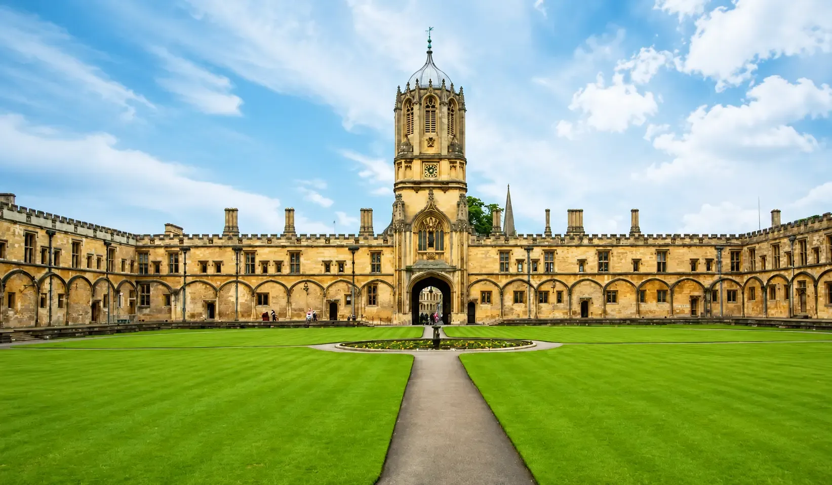 A historic view of the University of Oxford, featuring the Radcliffe Camera and surrounding academic buildings with classic English architecture.