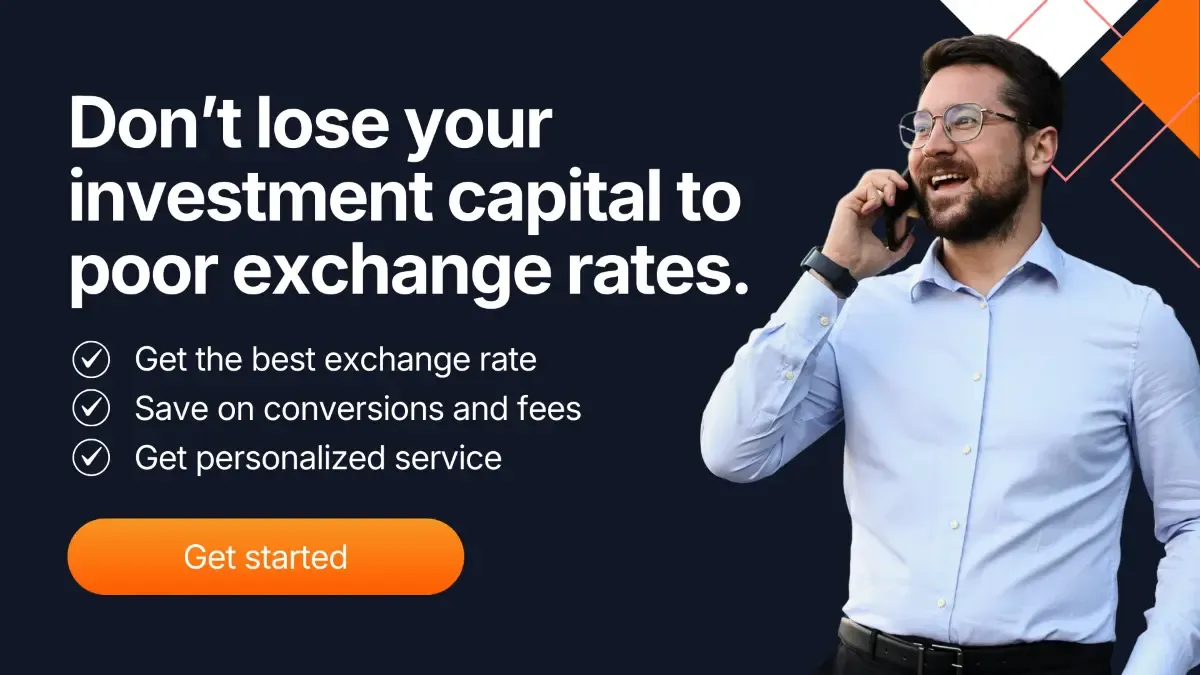 Business professional speaking on a phone beside a banner about protecting investment capital from poor exchange rates, highlighting better rates, lower conversion fees, and personalized FX service.