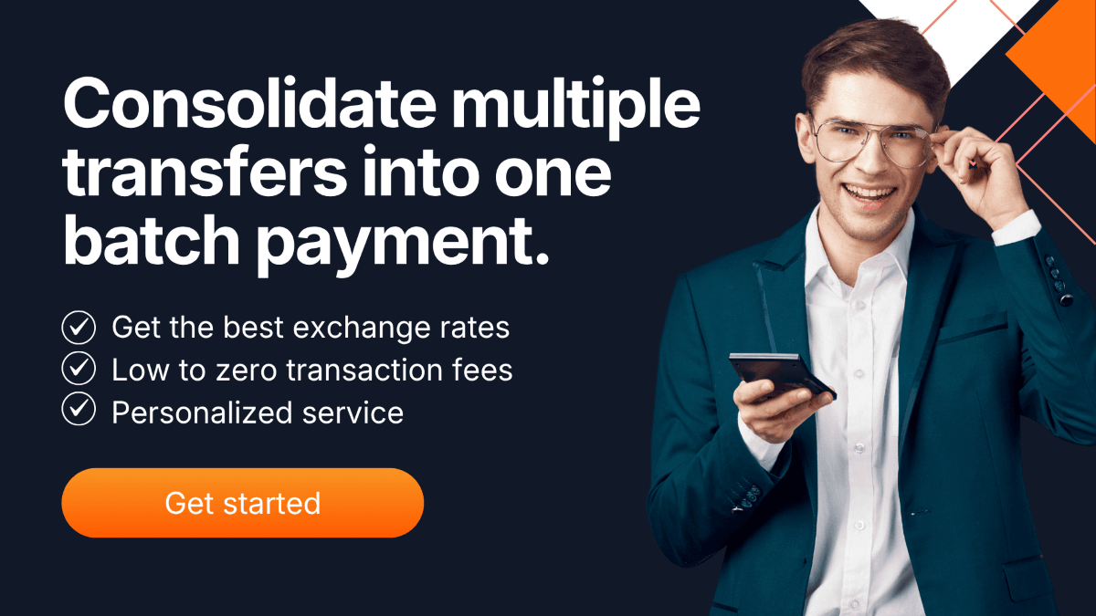 Business professional holding a phone promoting consolidated batch payments with benefits like low fees and personalized service