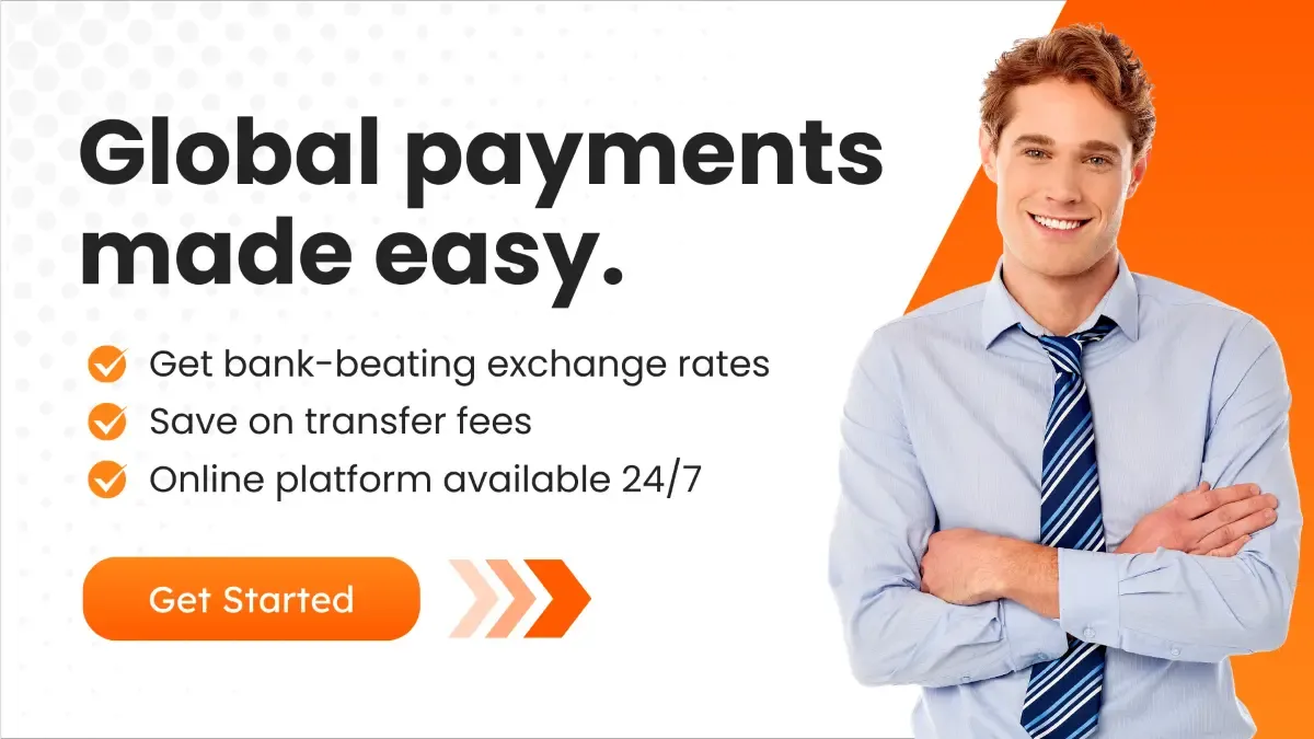 Global payment ad with a smiling businessman with arms crossed next to text promoting easy global payments, bank-beating exchange rates, and 24/7 online platform access.