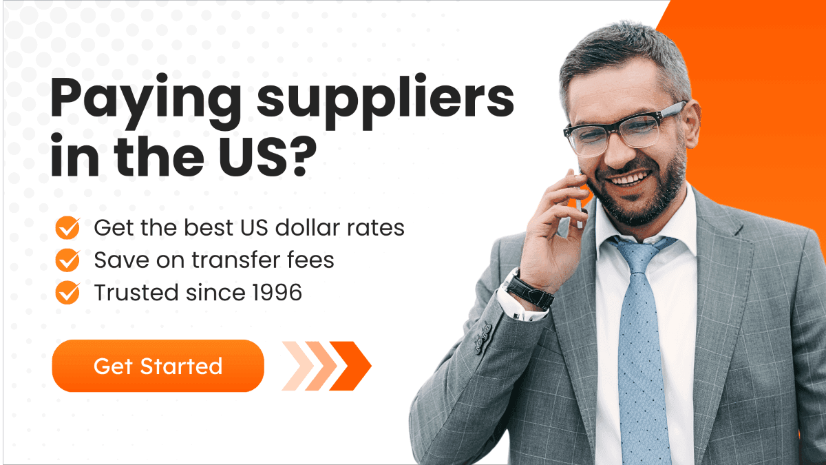 CTA Visual showing a smiling middle-aged businessman in a gray suit talking on his phone.