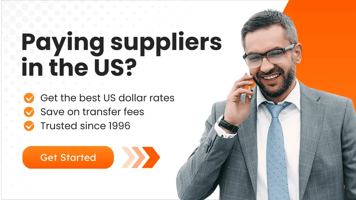 CTA Visual showing a smiling middle-aged businessman in a gray suit talking on his phone.