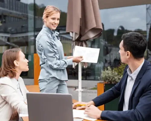 Team of professionals reviewing investment plans and market opportunities.