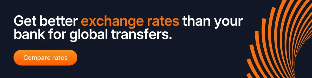 Dark blue banner with bold text promoting better exchange rates than banks for global transfers, featuring orange “Compare rates” button and abstract financial design elements.