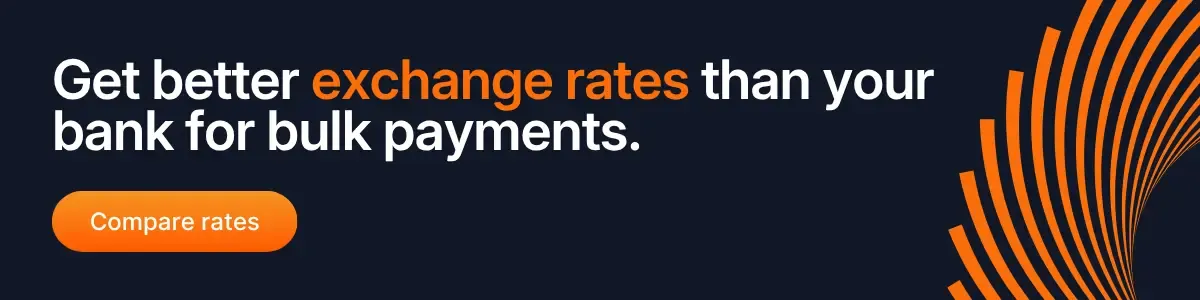 Bulk payments banner highlighting better exchange rates than banks with orange compare rates button on dark background
