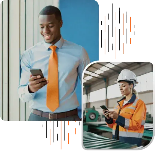 Businessman smiling while checking his phone and female warehouse worker in safety gear using a mobile device.