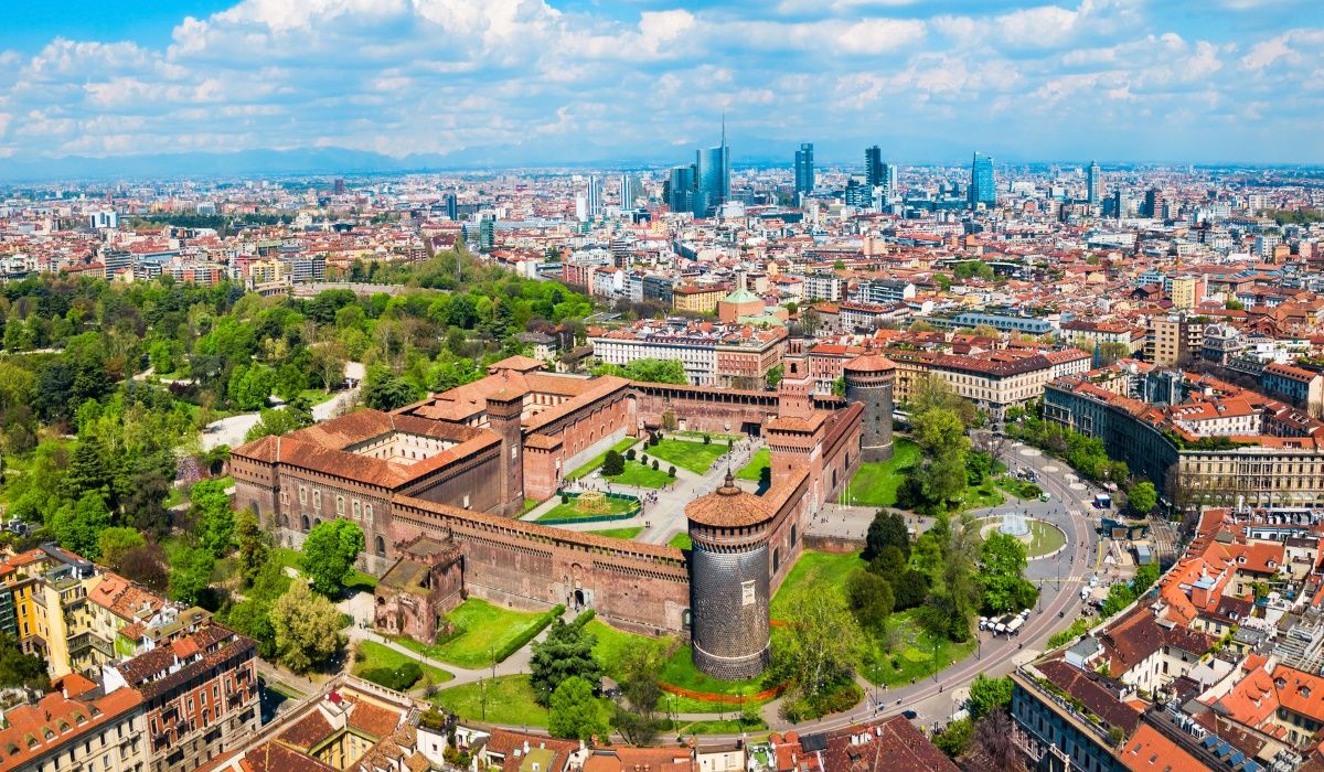 Aerial view of Castello Sforzesco and the city skyline of Milan, Italy.