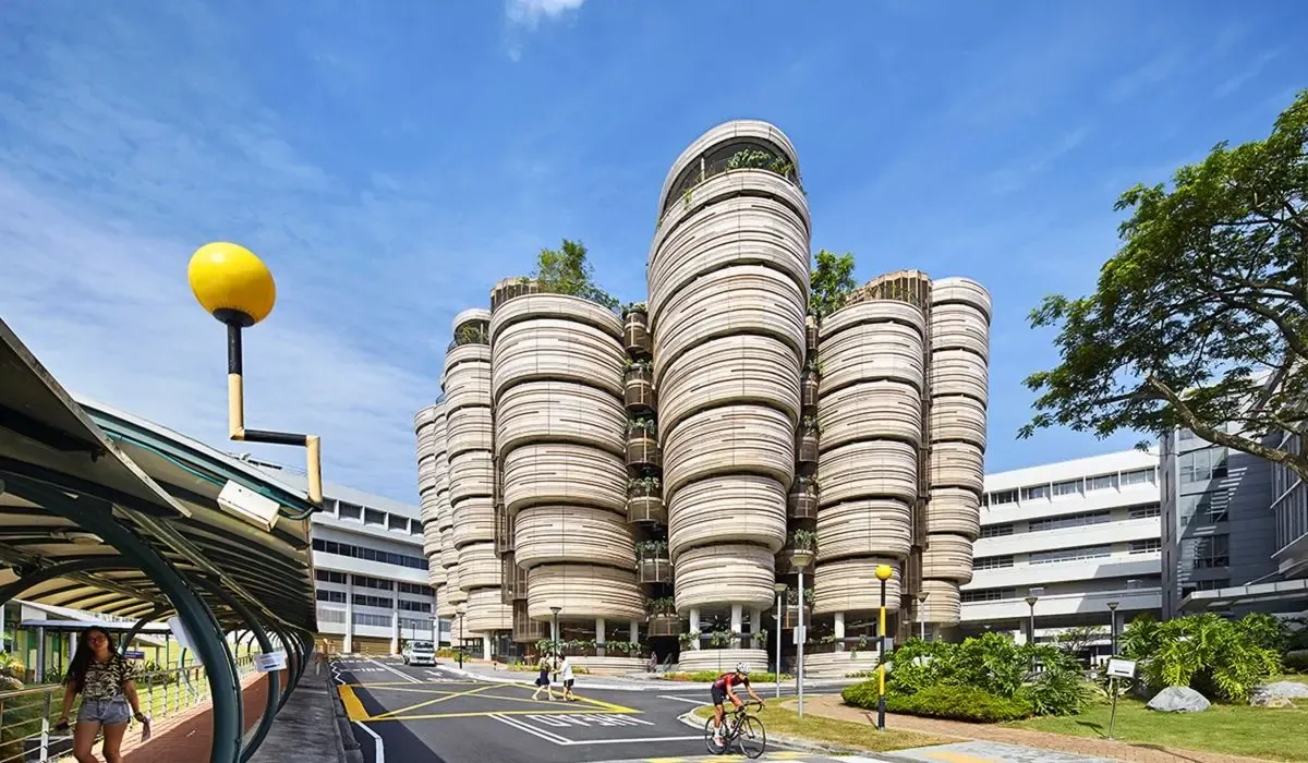 The Hive building at Nanyang Technological University, known for its unique beehive-like structure and innovative architectural design.​
