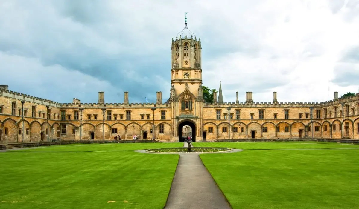 A historic view of the University of Oxford, featuring the Radcliffe Camera and surrounding academic buildings with classic English architecture.