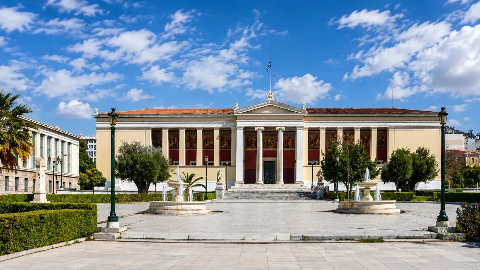Neoclassical building with fountains in Athens, Greece.