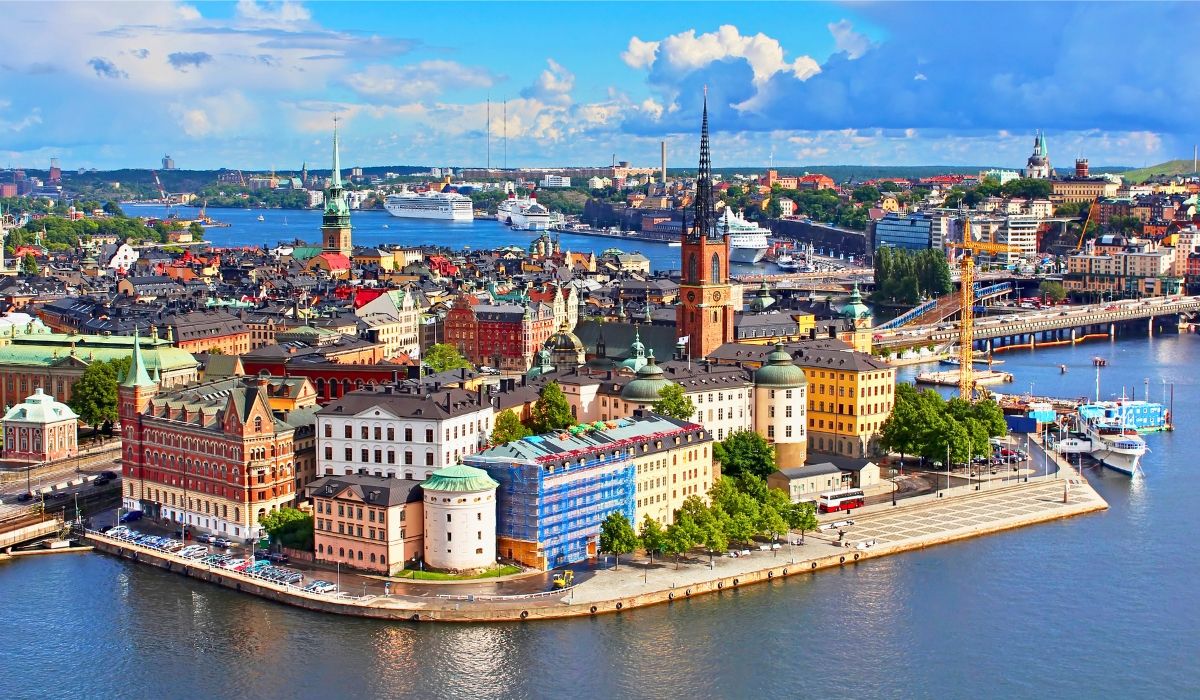 An image of Stockholm's Gamla Stan (Old Town), Sweden, showcasing cobblestone streets, colorful historic buildings, and a serene waterfront.