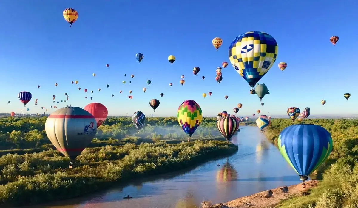 Hot air balloons floating over the Rio Grande in Albuquerque, New Mexico