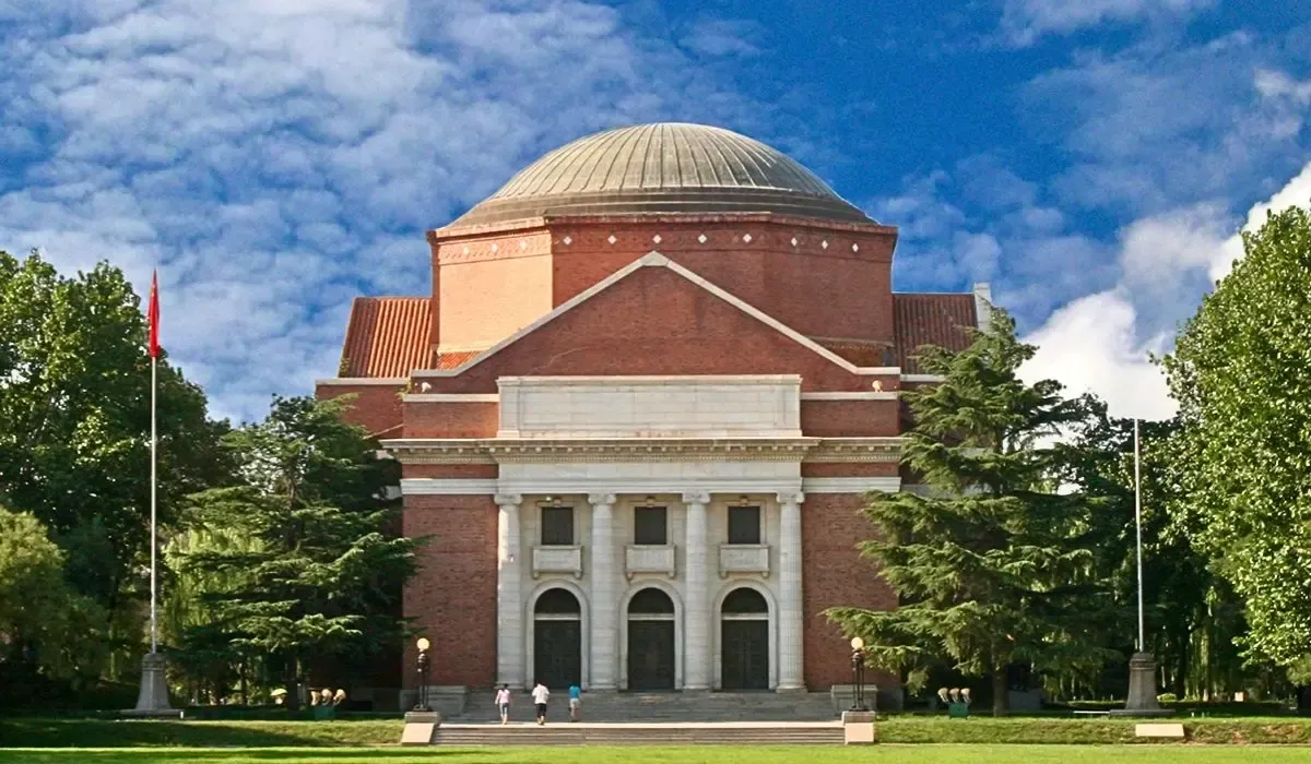 A historic building at Tsinghua University, featuring traditional Chinese architectural details and a serene campus setting.