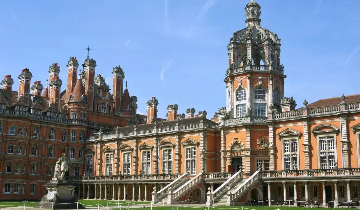 The riverside view of King's College London along the Thames, showcasing historic facades and city surroundings.