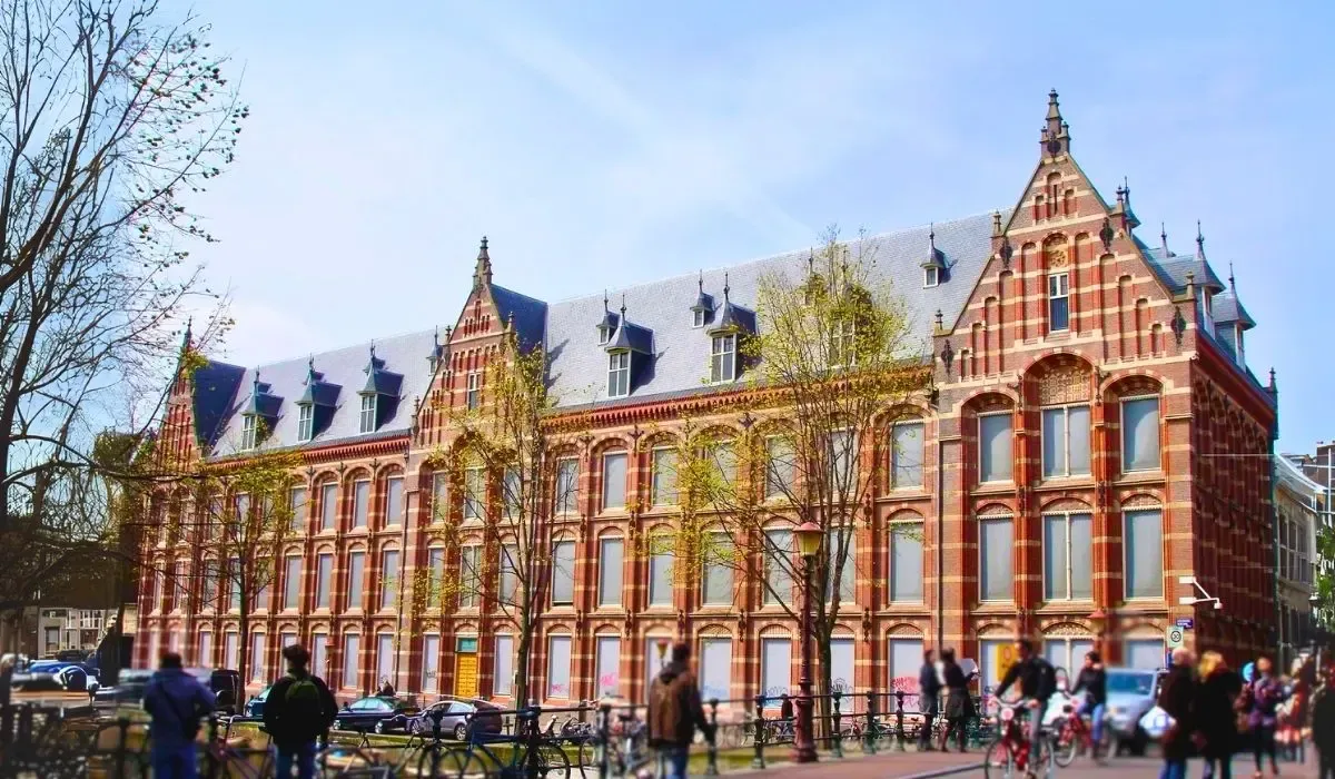 Classic red brick university building in Amsterdam’s canal district. Canadian students can transfer tuition in euros with MTFX and save on bank fees while studying in the Netherlands.
