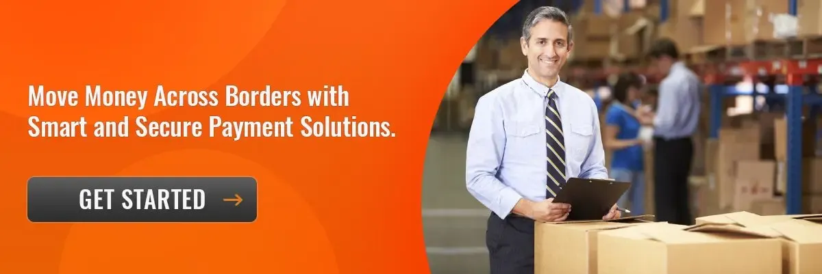Smiling warehouse manager standing among boxes in a fulfillment center, promoting secure international payment solutions with a “Get Started” call-to-action.