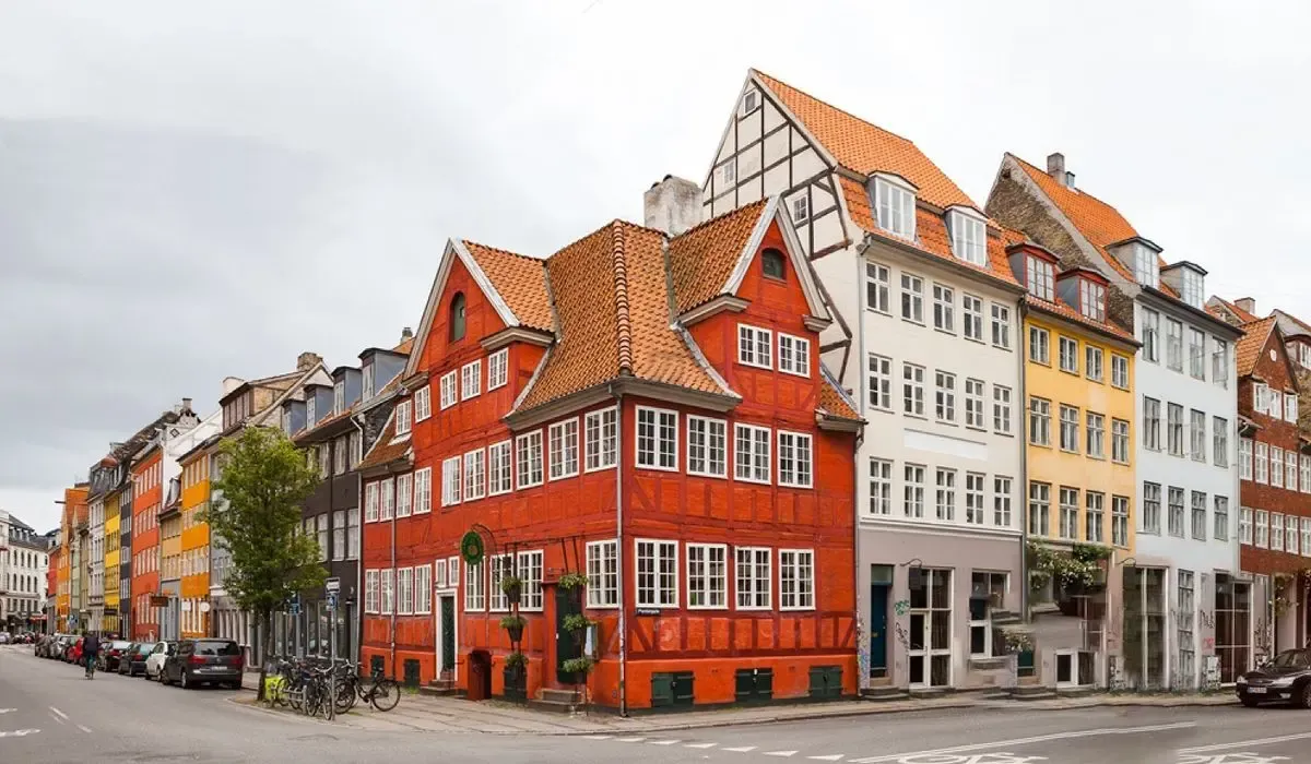 Colorful traditional buildings on a street in Copenhagen, Denmark, representing international money transfers to Denmark with MTFX.