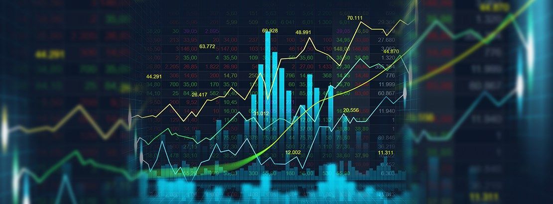 Financial data charts with multiple trend lines showing market volatility and currency exchange trends.