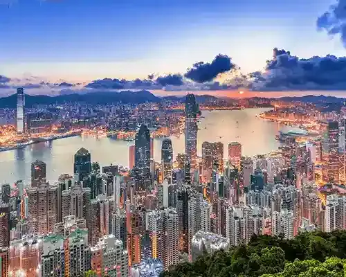 Panoramic view of Hong Kong skyline at night representing international money transfers