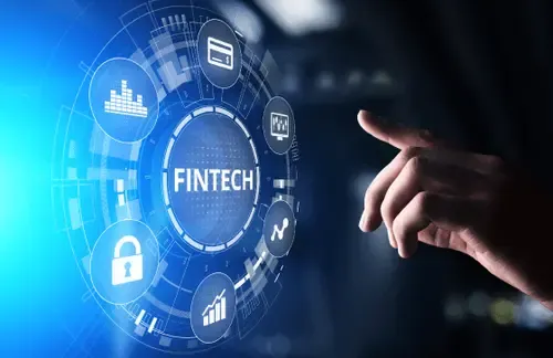 A hand pointing at a glowing digital interface labeled "FINTECH," surrounded by finance and security icons—illustrating the innovation and efficiency of fintech solutions compared to traditional banks.
