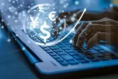 Person typing on a laptop with digital currency symbols (dollar, euro, yen, pound) and data network graphics overlayed, representing global money transfers.